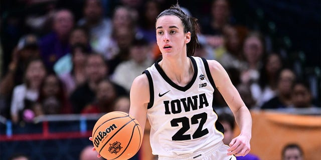 Caitlin Clark, #22 of the Iowa Hawkeyes, dribbles the ball against the Louisiana State Tigers during the 2023 NCAA Women's Basketball Tournament National Championship at American Airlines Center on April 2, 2023 in Dallas.