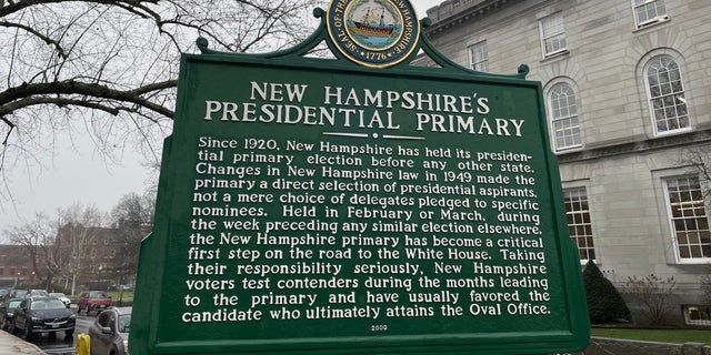 The sign outside the New Hampshire Capitol in Concord honors the state's cherished century-old tradition of holding the nation's first presidential primary in the race for the White House.