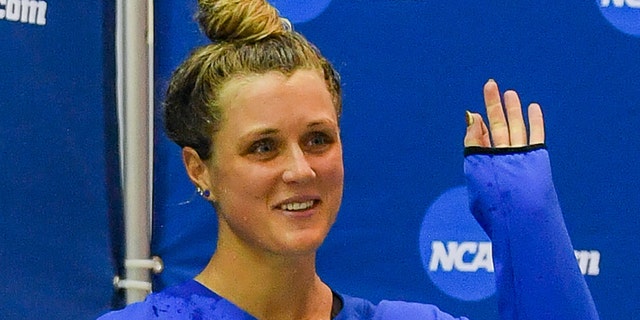 University of Kentucky swimmer Riley Gaines reacts after finishing tied for 5th in the 200 Freestyle finals at the NCAA Swimming and Diving Championships on March 18, 2022 at the McAuley Aquatic Center in Atlanta.