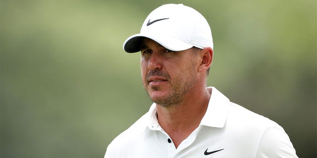 Brooks Koepka of the United States looks on from the 18th green during the second round of the 2023 Masters Tournament at Augusta National Golf Club on April 7, 2023, in Augusta, Georgia. (Photo by Christian Petersen/Getty Images)