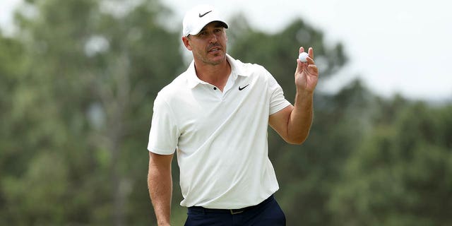 Brooks Koepka of the United States reacts on the 18th green during the second round of the 2023 Masters Tournament at Augusta National Golf Club on April 7, 2023, in Augusta, Georgia. 