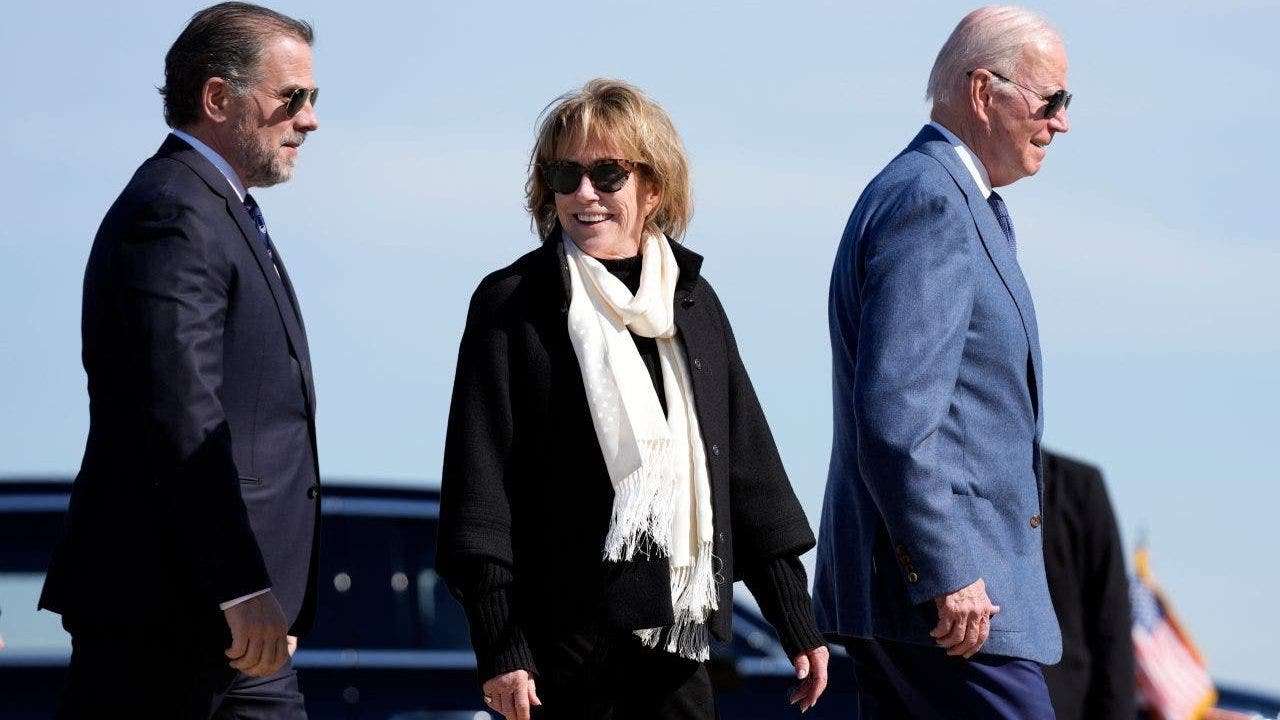 President Joe Biden walks to board Air Force One