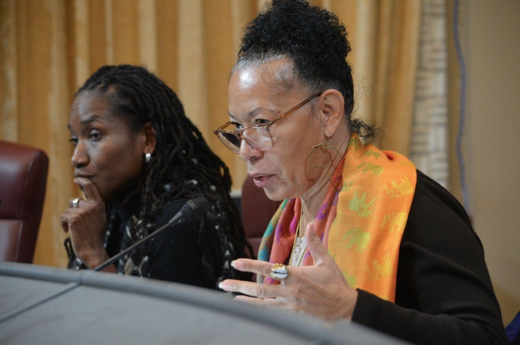 Cheryl Grills, right, and Lisa Holder, left, both members of the California Reparations Task Force