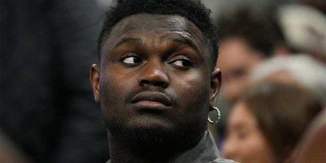 Zion Williamson of the New Orleans Pelicans, out due to injury, watches from the bench during a game against the Golden State Warriors at Chase Center March 28, 2023, in San Francisco.  