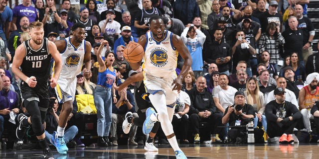 Draymond Green #23 of the Golden State Warriors moves the ball during Round 1 Game 2 of the 2023 NBA Playoffs on April 17, 2023, at Golden 1 Center in Sacramento, California. 