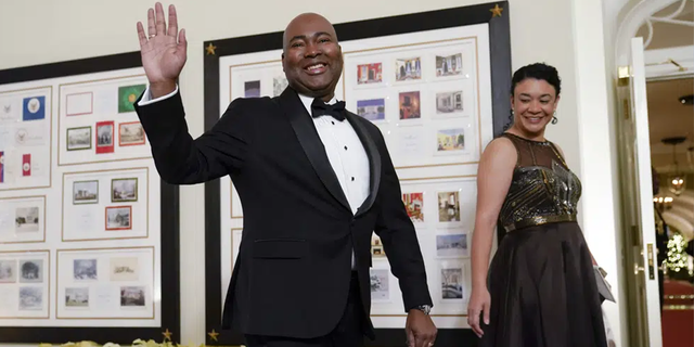 Democratic National Committee Chair Jaime Harrison and his wife Marie Boyd arrive for the State Dinner with President Joe Biden and French President Emmanuel Macron at the White House, Dec. 1, 2022.