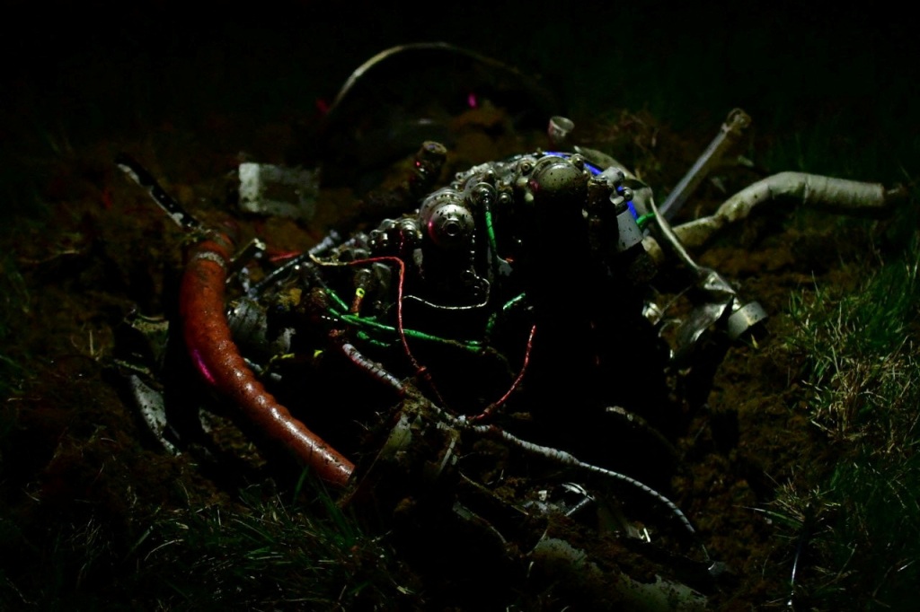 Debris from the helicopter crash is pictured at the crash site in Trigg County, Kentucky, U.S., March 29, 2023.