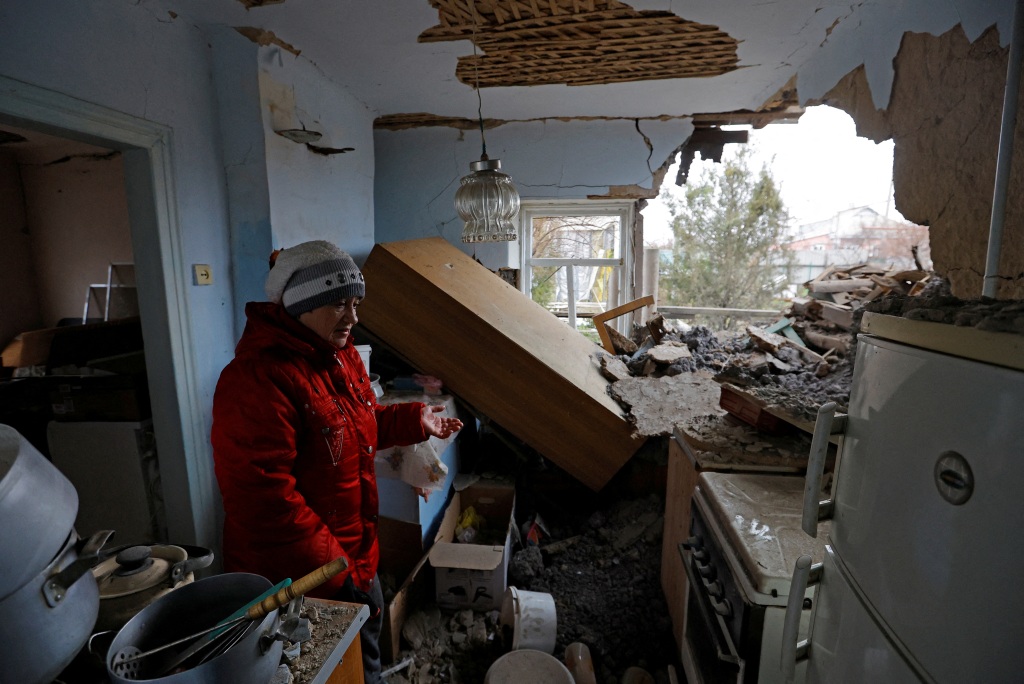 Local resident Galina Slepko stands inside her house which was heavily damaged in recent shelling during Russia-Ukraine conflict, in Horlivka, Ukraine, on April 3, 2023. 