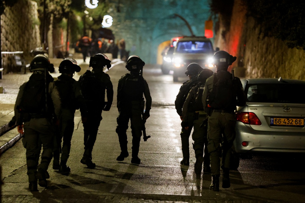 Israeli border policemen patrol near Al-Aqsa compound also known to Jews as the Temple Mount, while tension arises during clashes with Palestinians in Jerusalem's Old City, on April 5, 2023. 