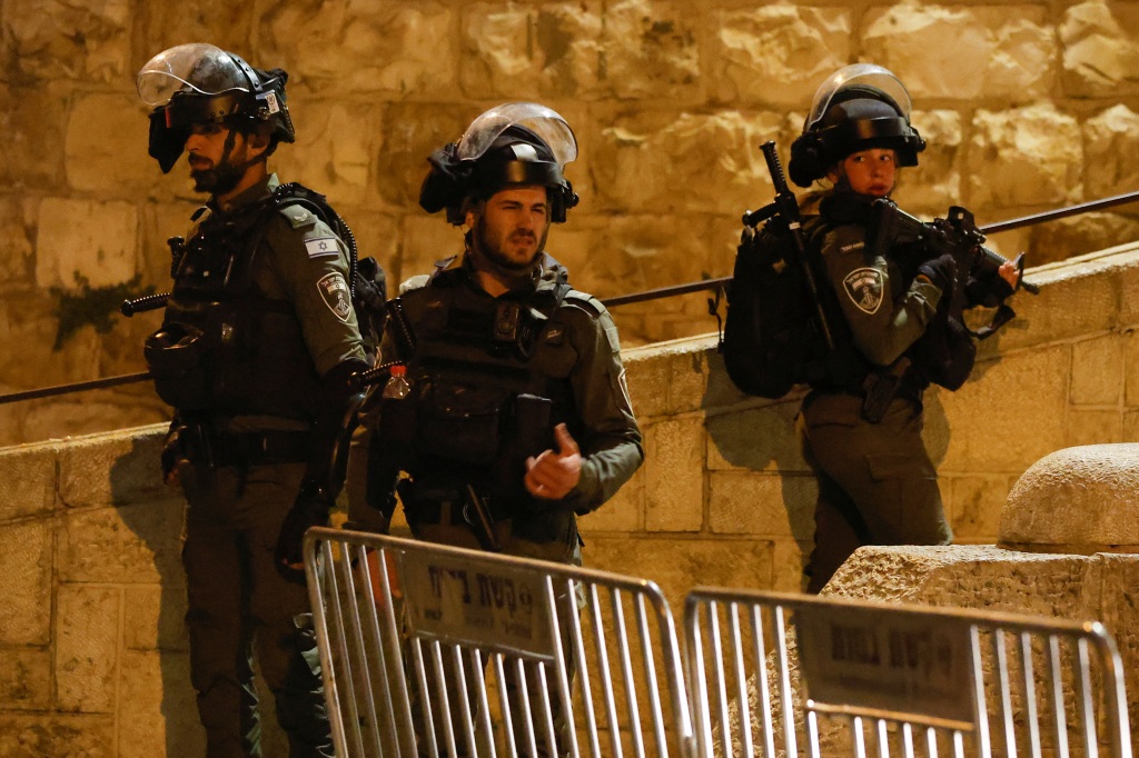 Israeli border policemen take position near Al-Aqsa compound also known to Jews as the Temple Mount, while tension arises during clashes with Palestinians in Jerusalem's Old City, on April 5, 2023. 
