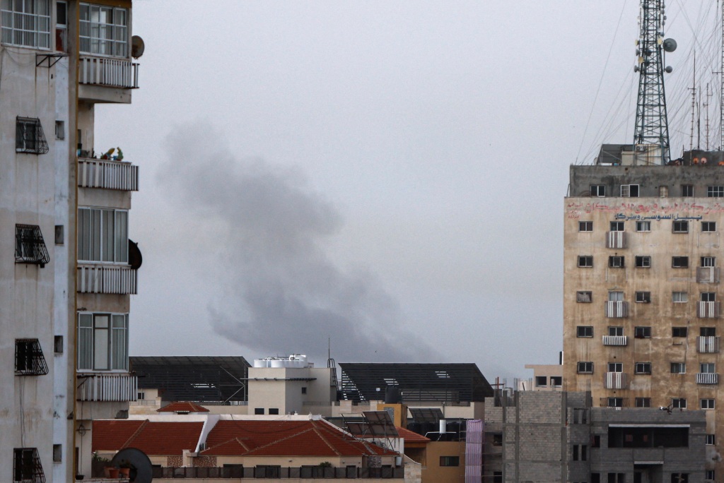 More smoke rises from buildings during Israeli airstrikes in Gaza on April 5, 2023. 