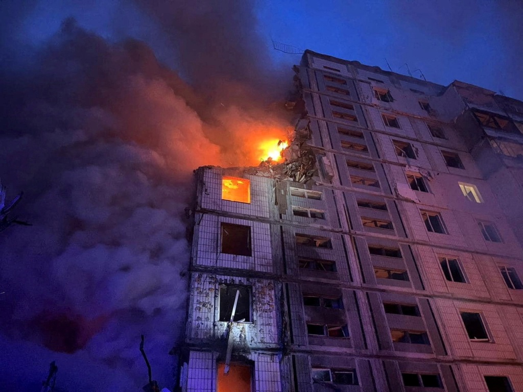 In the central town of Uman, three people were killed and eight wounded when a missile hit an apartment building, setting it ablaze