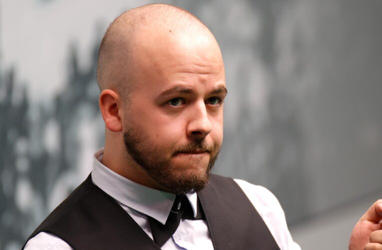 World Snooker Championship 2023: Luca Brecel holds nerve to see off Mark Williams challenge and book quarter-final spot