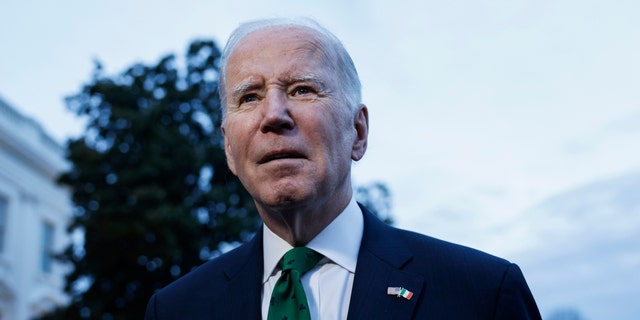 President Biden speaks with reporters before departing from the South Lawn of the White House on Marine One March 17, 2023, in Washington, D.C.