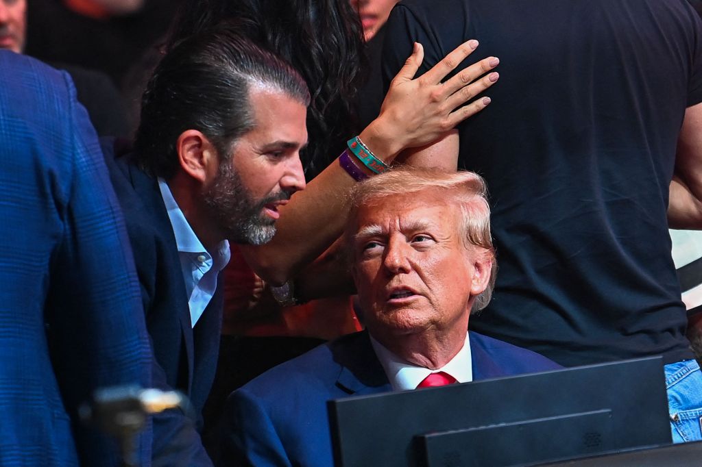 Former President Donald Trump and his son Donald Trump Jr. attend UFC 287 at the Kaseya Center in Miami, Florida, on April 8, 2023.