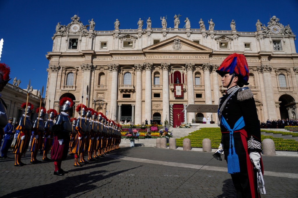 Vatican Swiss Guards take position in St. Peter's Square at The Vatican where Pope Francis will celebrate the Easter Sunday mass on April 9, 2023.