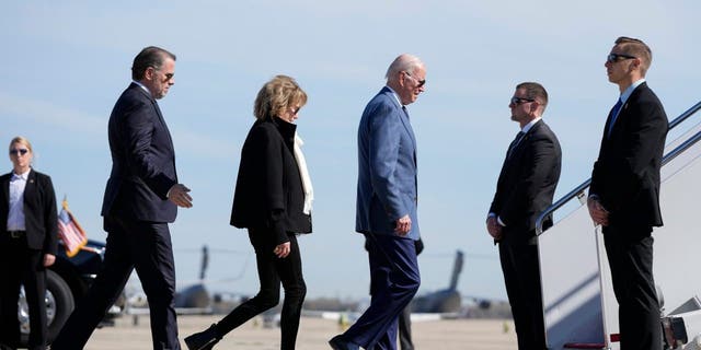 President Joe Biden walks to board Air Force One with his son Hunter Biden, left, and sister Valerie Biden at Andrews Air Force Base, Md., on Tuesday, April 11, 2023.