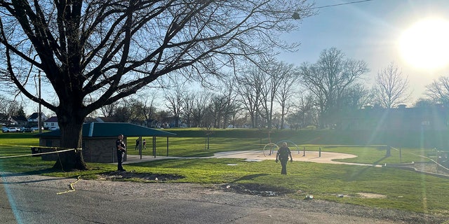 Officers guard the scene of a shooting that broke out during a memorial at McCormick Park on Wednesday, April 12, 2023, in Fort Wayne.