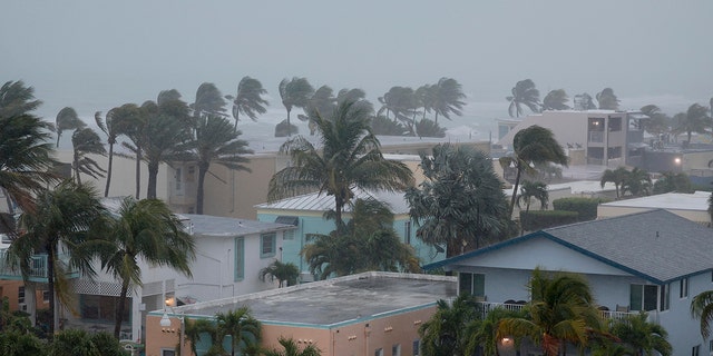 A Hollywood beach is empty during heavy, Wednesday, April 12, 2023, in Hollywood, Fla. 