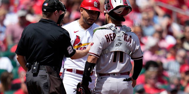 Willson Contreras speaks to the Arizona catcher