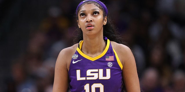 Angel Reese, #10 of the LSU Lady Tigers, looks on during the first half against the Virginia Tech Hokies during the 2023 NCAA Women's Basketball Tournament Final Four semifinal game at American Airlines Center on March 31, 2023 in Dallas.