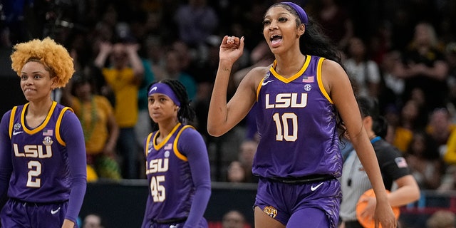 LSU's Angel Reese waves goodbye after Iowa's Monika Czinano fouls out during the second half of the NCAA Women's Final Four championship basketball game Sunday, April 2, 2023, in Dallas.