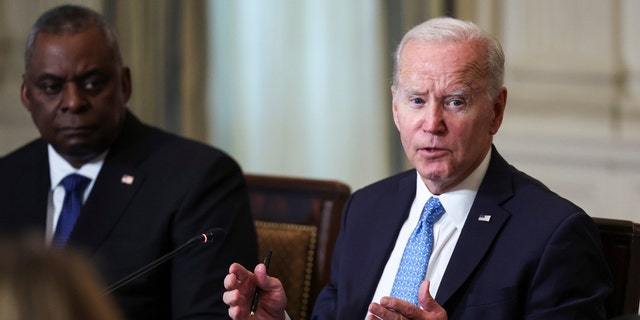 President Biden, right, and Secretary of Defense Lloyd Austin