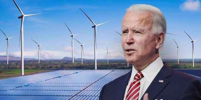 President Joe Biden with a solar energy panel and wind turbines in the background