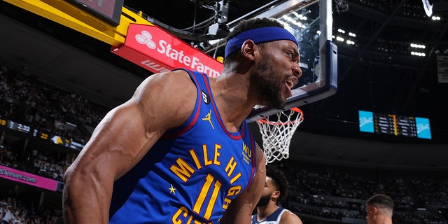 Bruce Brown #11 of the Denver Nuggets celebrates during Round One Game One of the 2023 NBA Playoffs against the Minnesota Timberwolves on April 16, 2023 at the Ball Arena in Denver, Colorado. 