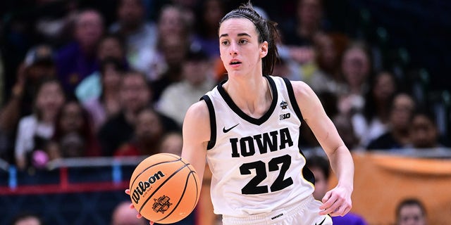 Caitlin Clark of the Iowa Hawkeyes dribbles the ball against the Louisiana State Tigers during the NCAA championship game on April 2, 2023 in Dallas.