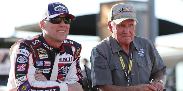 Kevin Harvick rides with Hall of Famer Cale Yarborough during pre-race festivities for the NASCAR Sprint Cup Series Bojangles' Southern 500 at Darlington Raceway on Sept. 4, 2016, in South Carolina.