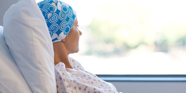 cancer patient looks out window