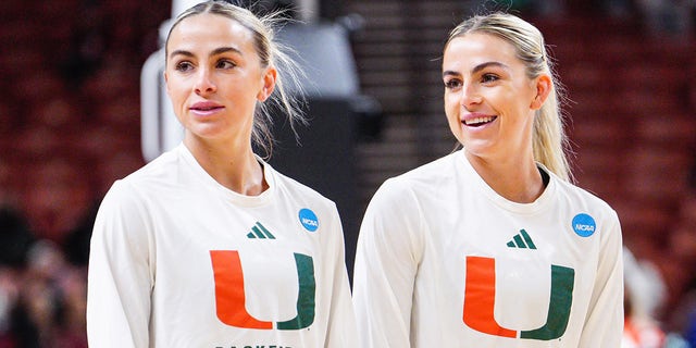 Haley and Hanna Cavinder of the Miami Hurricanes on March 24, 2023, in Greenville, South Carolina.