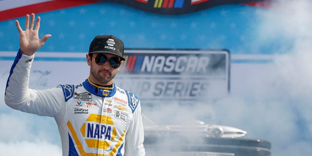 Chase Elliott waves to fans