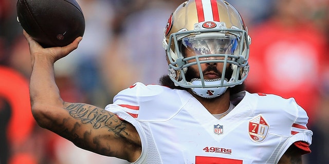 Colin Kaepernick of the San Francisco 49ers throws a pass during the first half against the Los Angeles Rams at Los Angeles Memorial Coliseum Dec. 24, 2016, in Los Angeles. 