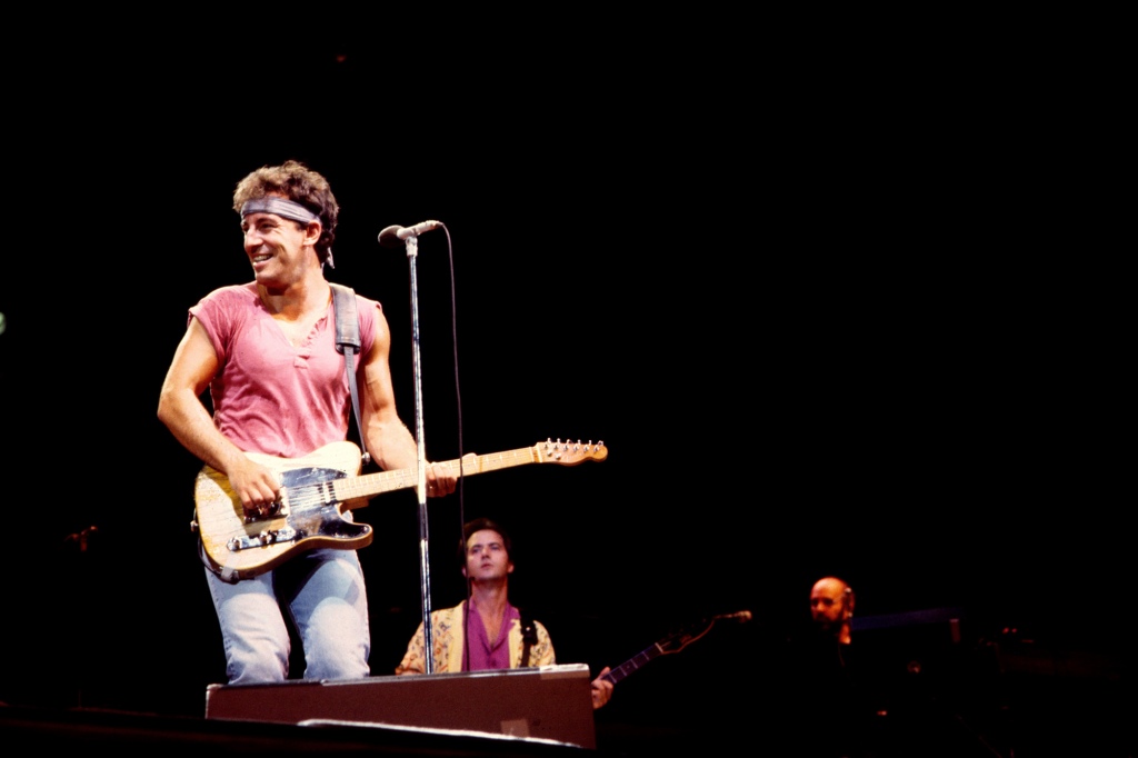 Springsteen plays guitar as he performs onstage, with the E Street Band, during the 'Born in the USA' tour, at Giants Stadium, East Rutherford, New Jersey, August 22, 1985.