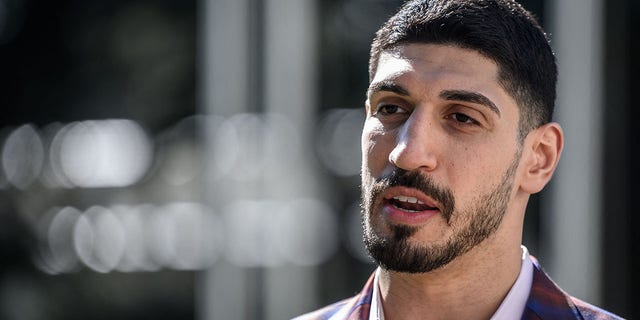 American basketball player Enes Kanter Freedom speaks during an interview with AFP at the United Nations Office in Geneva on April 5, 2022.