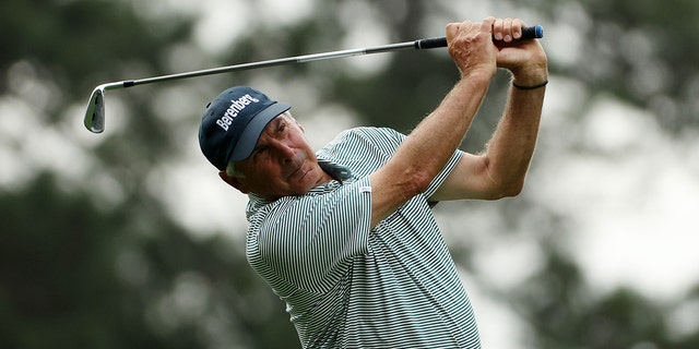 Fred Couples plays his shot from the fourth tee during the Masters Tournament at Augusta National Golf Club on April 6, 2023.