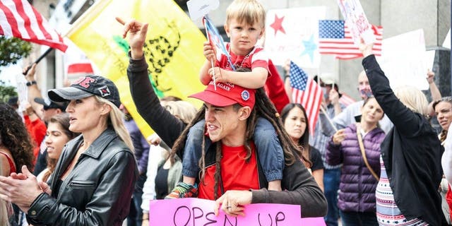 Demonstrators protest during a "Freedom Rally"