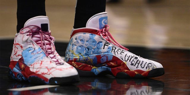 Basketball: Boston Celtics Enes Kanter Freedom's sneakers on court during game vs Los Angeles Clippers at Staples Center.