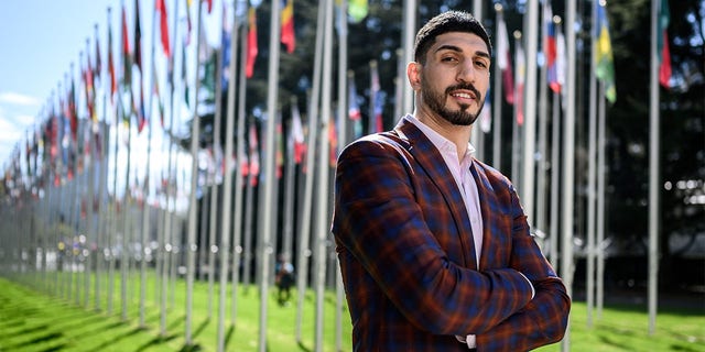 American basketball player Enes Kanter Freedom poses during an interview with AFP at the United Nations Office in Geneva on April 5, 2022. - Enes Kanter Freedom, whose human rights advocacy has ruffled feathers, hopes to bend UN human rights chief Michelle Bachelet's ear on Thursday about her forthcoming China visit. 