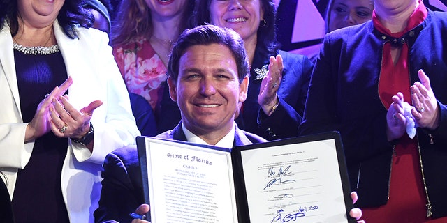 Governor Ron DeSantis signs Florida's 15-week abortion ban into law at Nacion de Fe church in Kissimmee. 