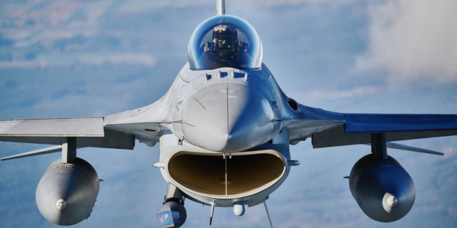 A F-16 fighter jet flies near Lask, central Poland.