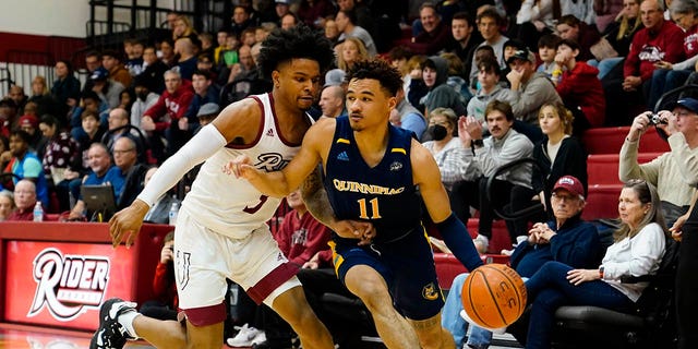 Quinnipiac Bobcats guard Dezi Jones (11) dribbles the ball against Rider Broncs guard Corey McKeithan (3) during the first half of a game Jan. 6. 2023, at Alumni Gymnasium in Lawrenceville, N.J.