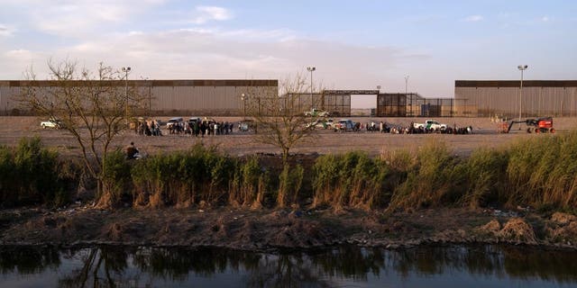 Migrants wait to be processed by United States Border Patrol seen from Ciudad Juarez, Chihuahua state, Mexico.