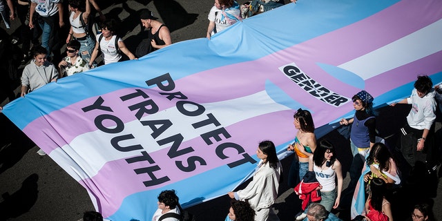 People take part in a rally on the occasion of the International Transgender Day of Visibility in the city center of Rome, Italy, on April 1, 2023. The White House also issued a statement condemning "MAGA extremists" for targeting trans kids. 