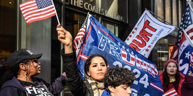 Supporters of former US President Donald Trump outside of Trump Tower in New York, US, on Monday, April 3, 2023. 