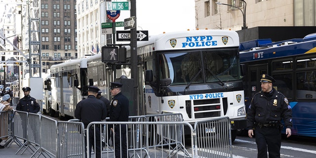 Members of the New York Police Department (NYPD) outside of Trump Tower in New York, US, on Monday, April 3, 2023. 