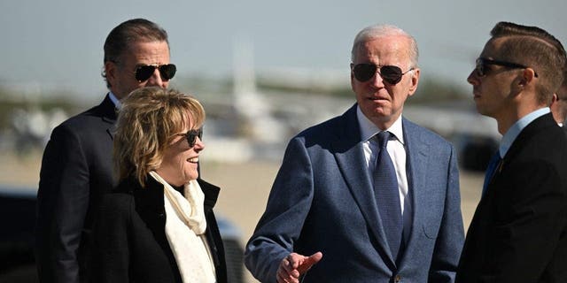 US President Joe Biden, with his sister Valerie Biden (2nd L), and son Hunter Biden (L), on April 11, 2023.