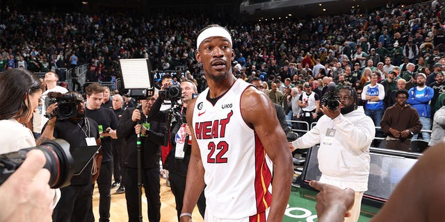 Jimmy Butler looks on after beating the Bucks